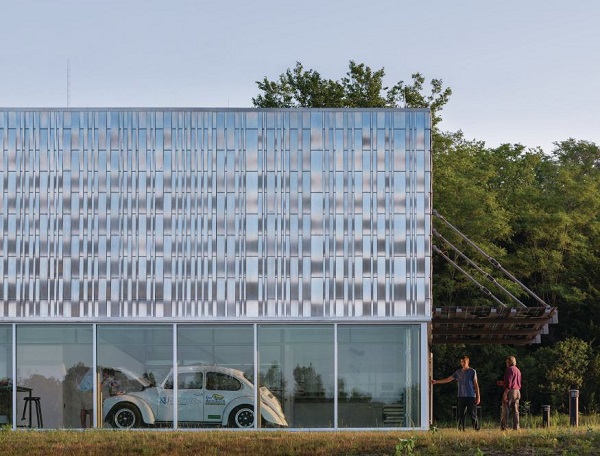 Exterior of Hill Engineering RDC building. A 1970's era Volkswagon Beetle can be seen through the glass front.