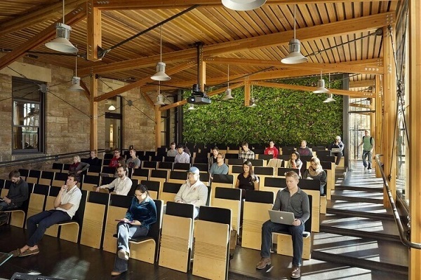 People sitting inside the auditorium style Marvin Forum.